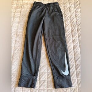 Nike Kids Black Joggers with White Swoosh Detail